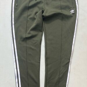 Woman’s Adidas Olive Green Track Pants with White Stripes zise L